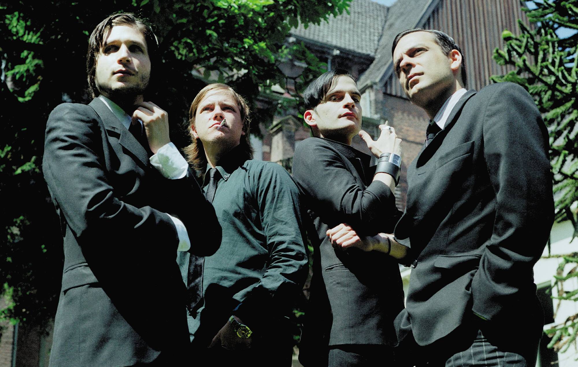 Interpol in Amsterdam, 2004. (Photo by Peter Pakvis/Redferns)